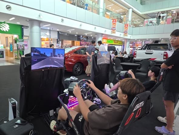 Toyota Yaris Challenge sim racing activation at a Toyota showroom